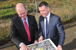 Caps placed on Woollen Mill development