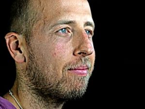 Gay rights activist Daniel Witthaus reads his book at Footscray library