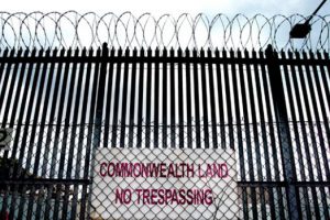 Hardened criminals put with asylum seekers