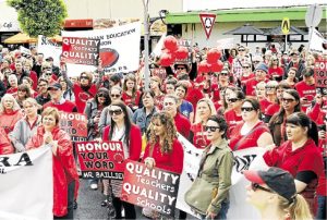 Western suburbs teachers walk out over pay offer that’s a ‘cut in real terms’