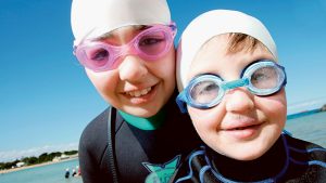 BEACH: Kids prove swimming’s cool