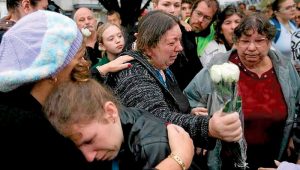 SUNSHINE: 600-plus at vigil for slain mum