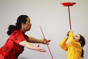 Chinese acrobat has Kingsville pupils in a spin