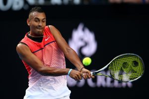Nick Kyrgios calmly through to second round