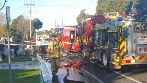 Fight to stop spread of Maribyrnong garage fire