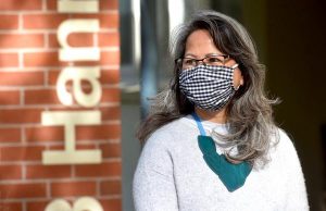 Vietnamese making masks for the vulnerable