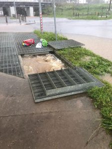 Boy saved from drowning in flooded drain