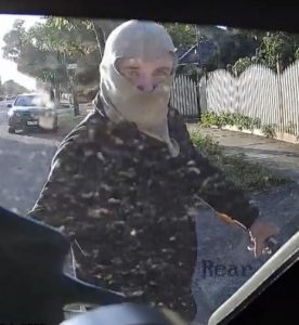 Traffic camera car operator threatened and vehicle damaged