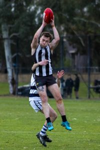 Magpies get first win