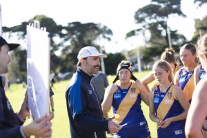 Henry steps down at CYs coach