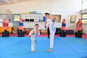 Brothers beat bullies and opponents