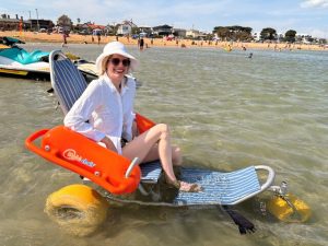 Imogen accesses Williamstown Beach wheelchair