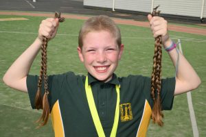 Natalie’s big shave raises big funds