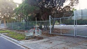 Neighbours fight ‘cage of rubbish’